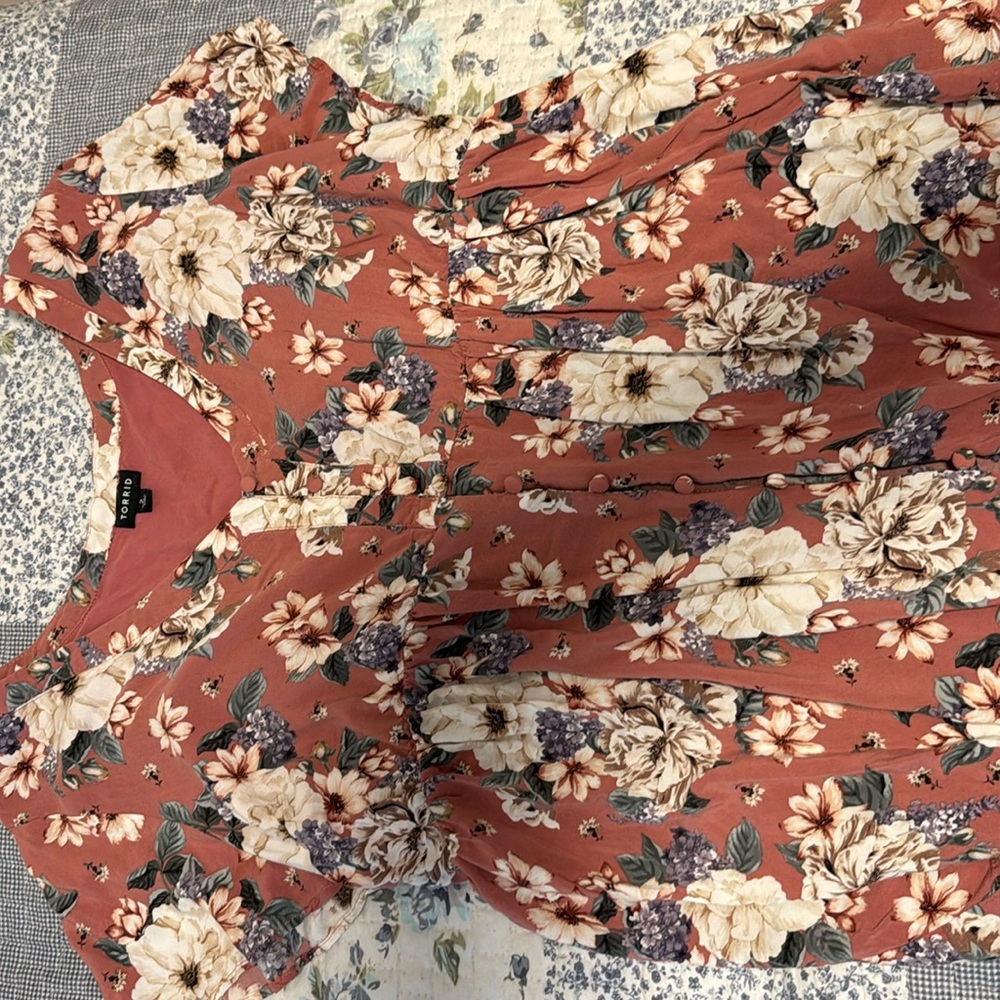 Torrid short sleeve blouse.